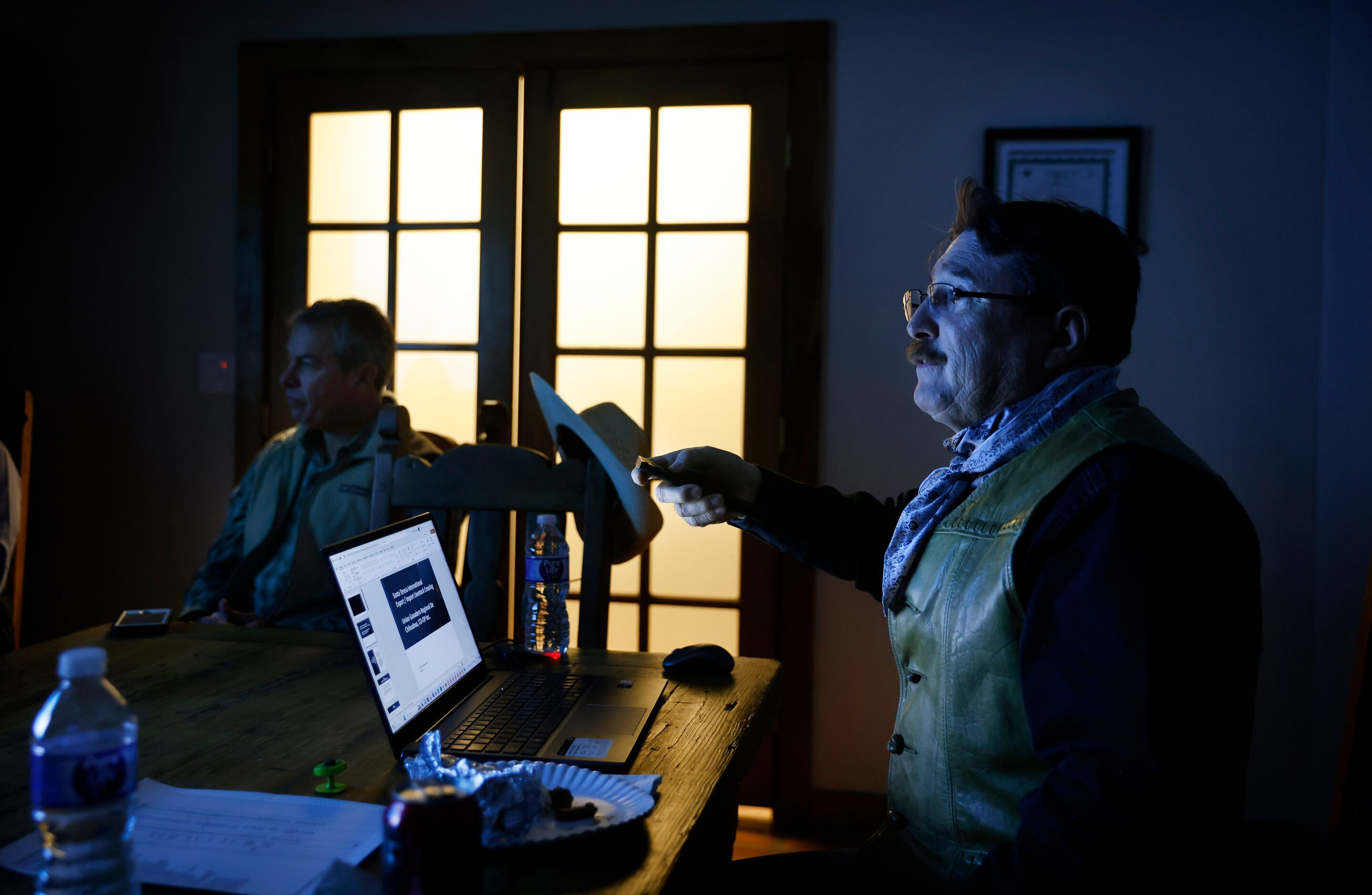 Director Daniel M. Manzanares delivers a video presentation to Chihuahuan ranchers during a...