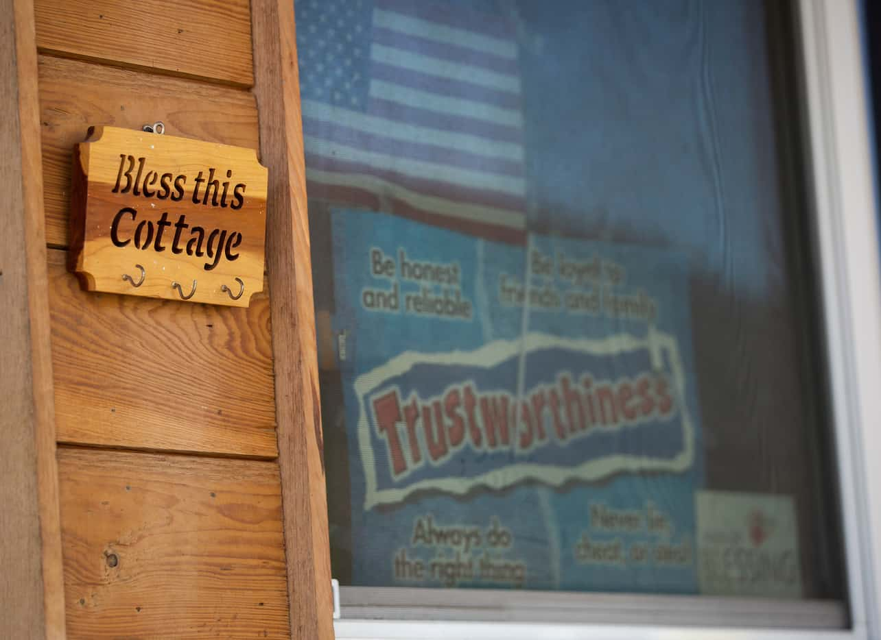 A residentÕs decorations outside of their tiny house at the Cottages at Hickory Crossing,...