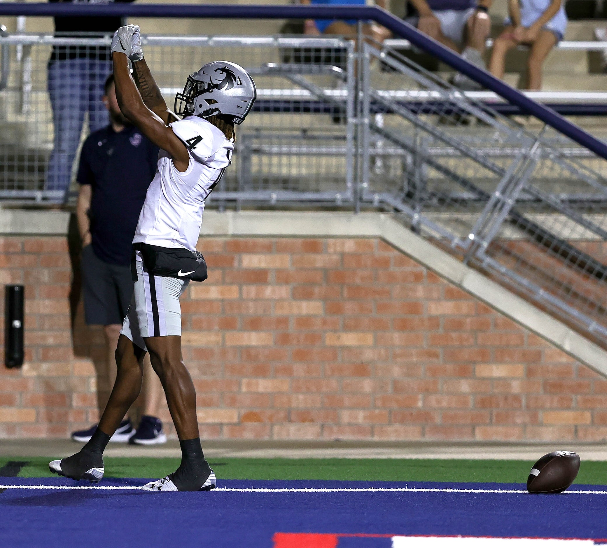 Denton Guyer wide receiver Josiah Martin celebrates his touchdown reception against Allen...