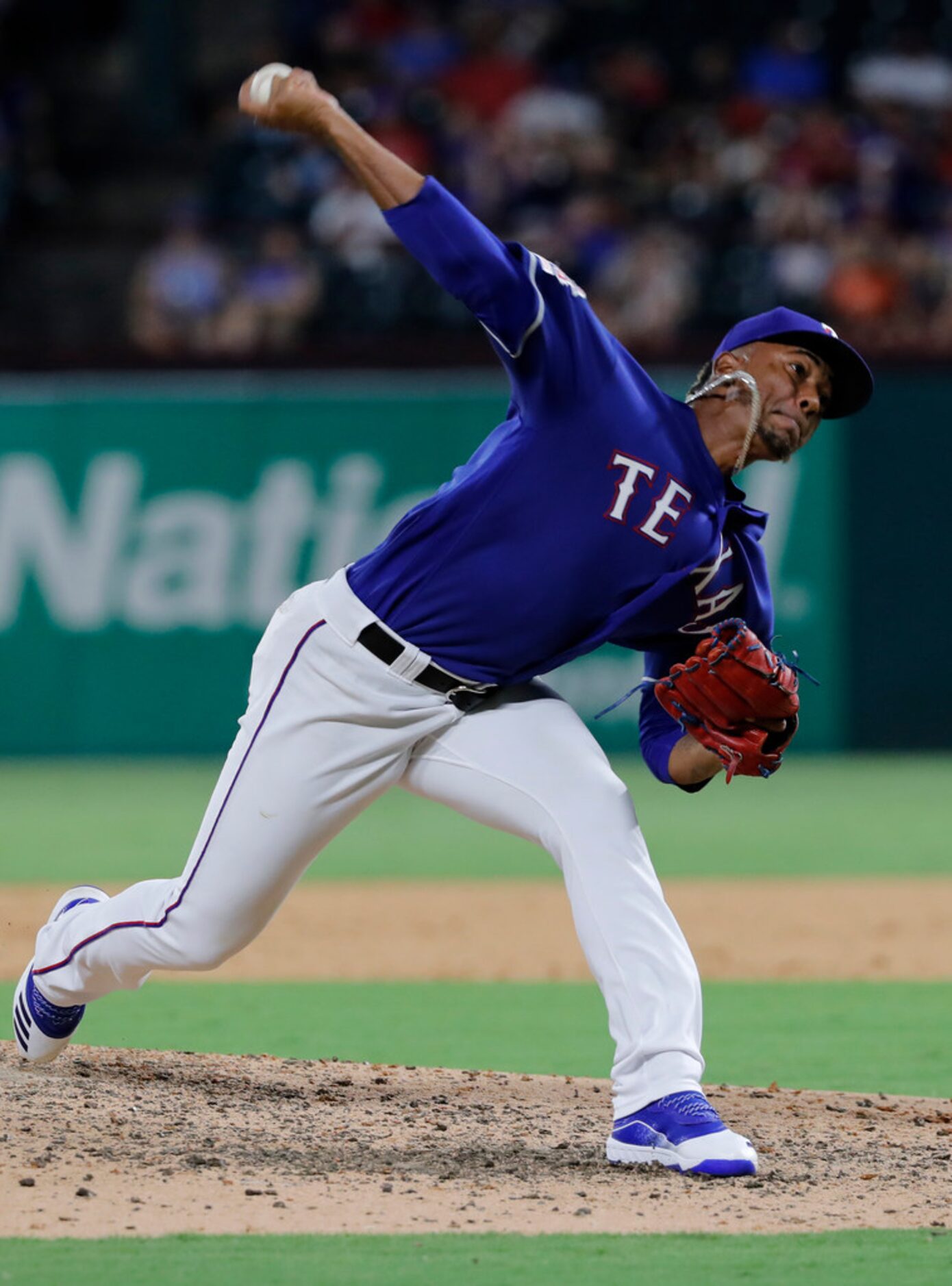 Texas Rangers relief pitcher Emmanuel Clase throws to a Minnesota Twins batter during the...