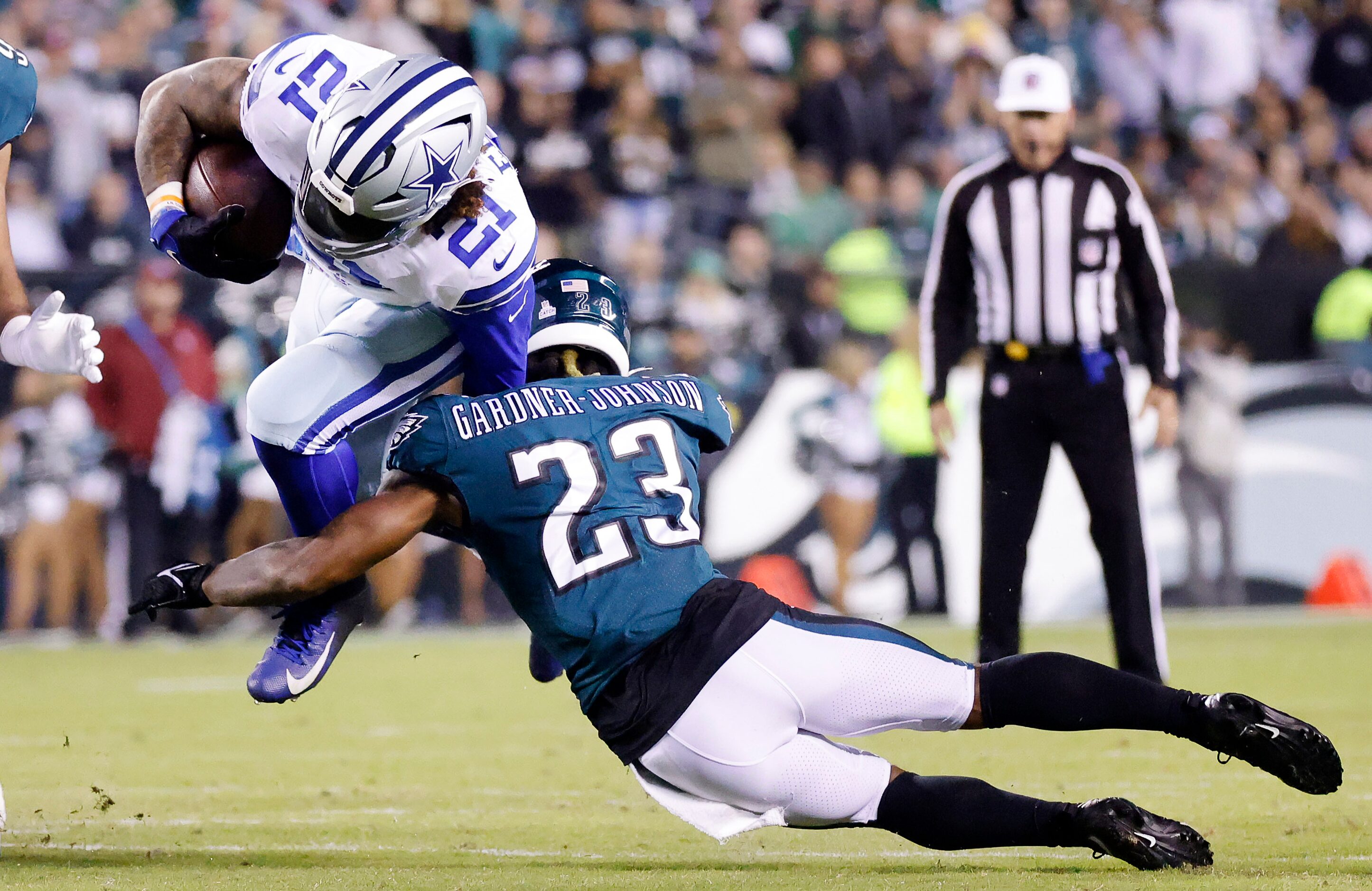 Philadelphia Eagles safety C.J. Gardner-Johnson (23) tackles Dallas Cowboys running back...