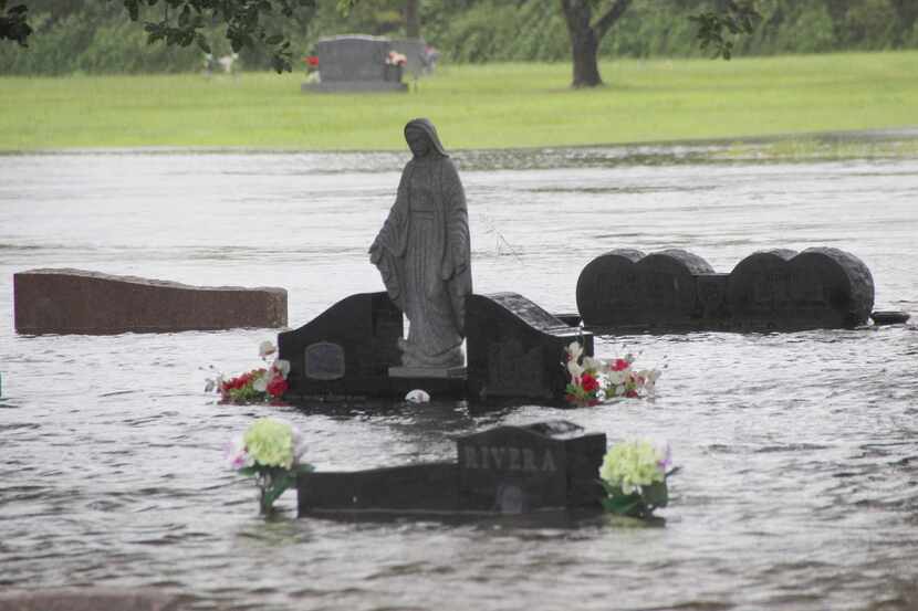 The South Park Cemetery in Pearland, Texas, is flooded by rains from Hurricane Harvey on...