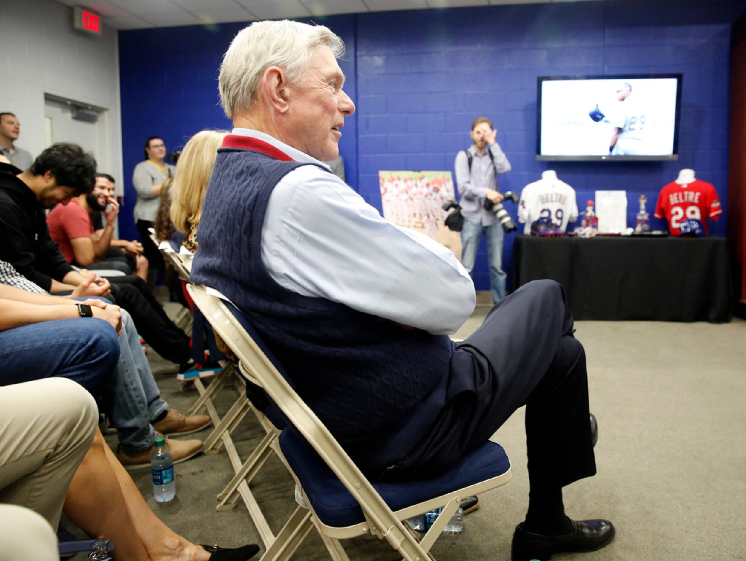 Texas Rangers co-owner Ray Davis listens to former Rangers third baseman Adrian Beltre,...