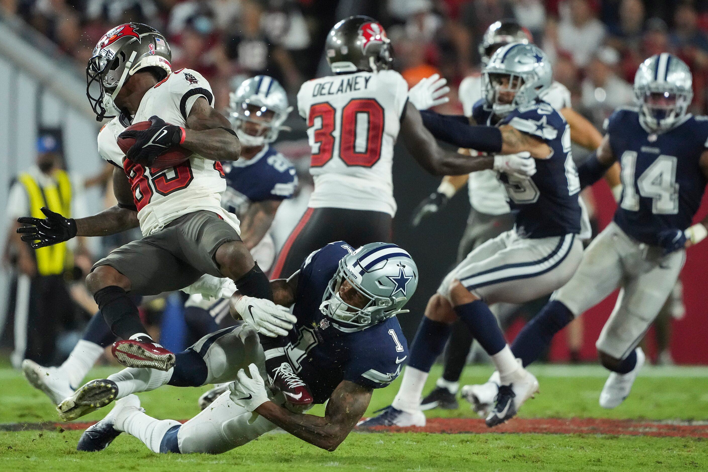 Dallas Cowboys wide receiver Cedrick Wilson (1) brings down Tampa Bay Buccaneers wide...