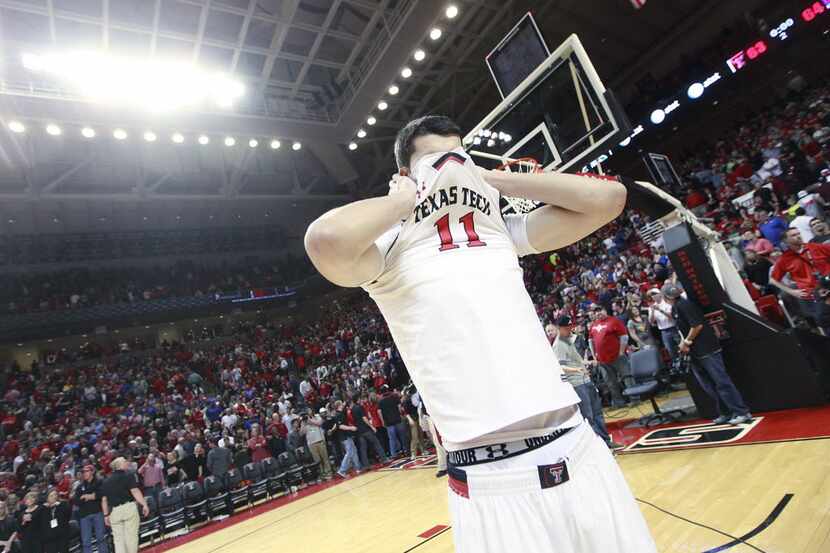 Texas Tech's Dejan Kravic reacts after his team was defeated by Kansas 64-63 during an NCAA...