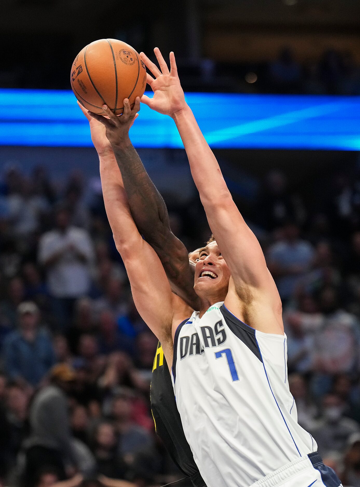 Dallas Mavericks center Dwight Powell (7) grabs a rebound away from Utah Jazz forward Jarred...