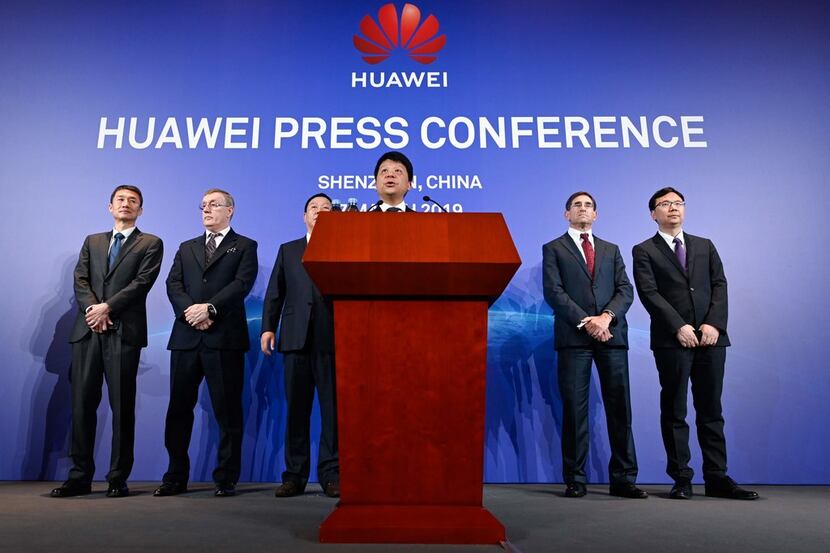 Huawei's rotating chairman Guo Ping speaks during a press conference in Shenzhen, China's...
