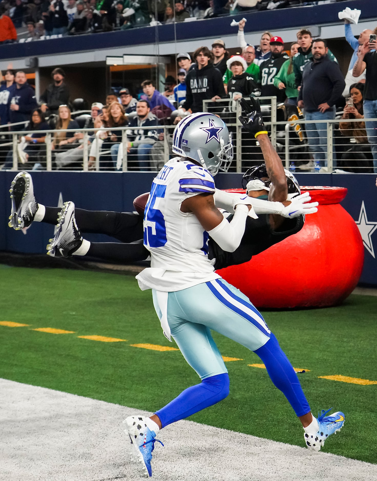 Dallas Cowboys cornerback Nahshon Wright (25) breaks up a pass in the end zone intended for...