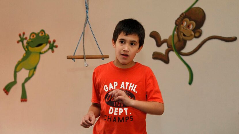 
David Henke, 10, of Plano, plays in the rec area during an open house.
