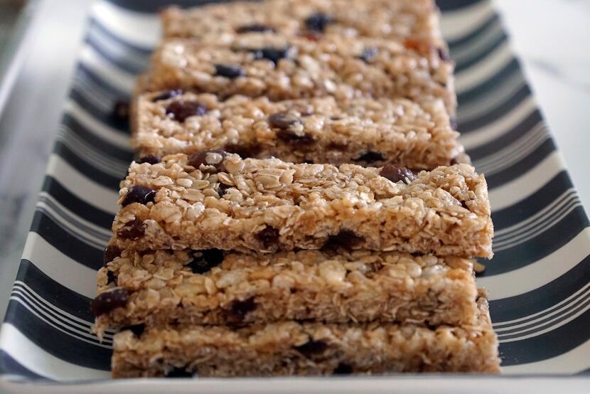 Kristen Massad prepared granola bars with her daughters and a family friend at her home in...