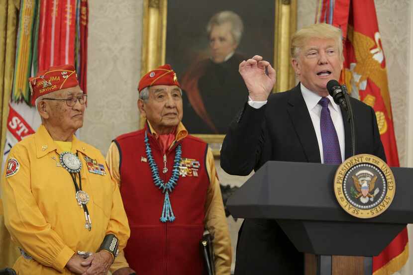 President Donald Trump speaks during an event honoring members of the Native American code...