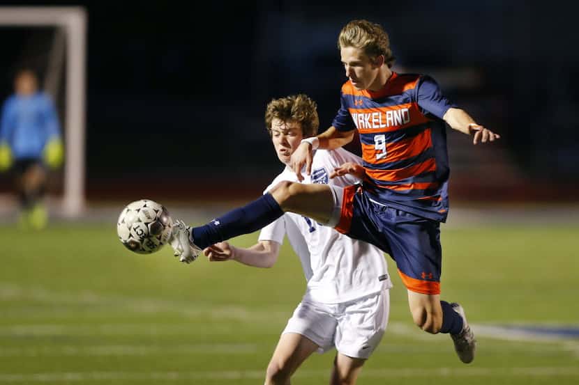 Frisco Wakeland Harrison Partain (9) flies through the air to take the ball from Wylie...