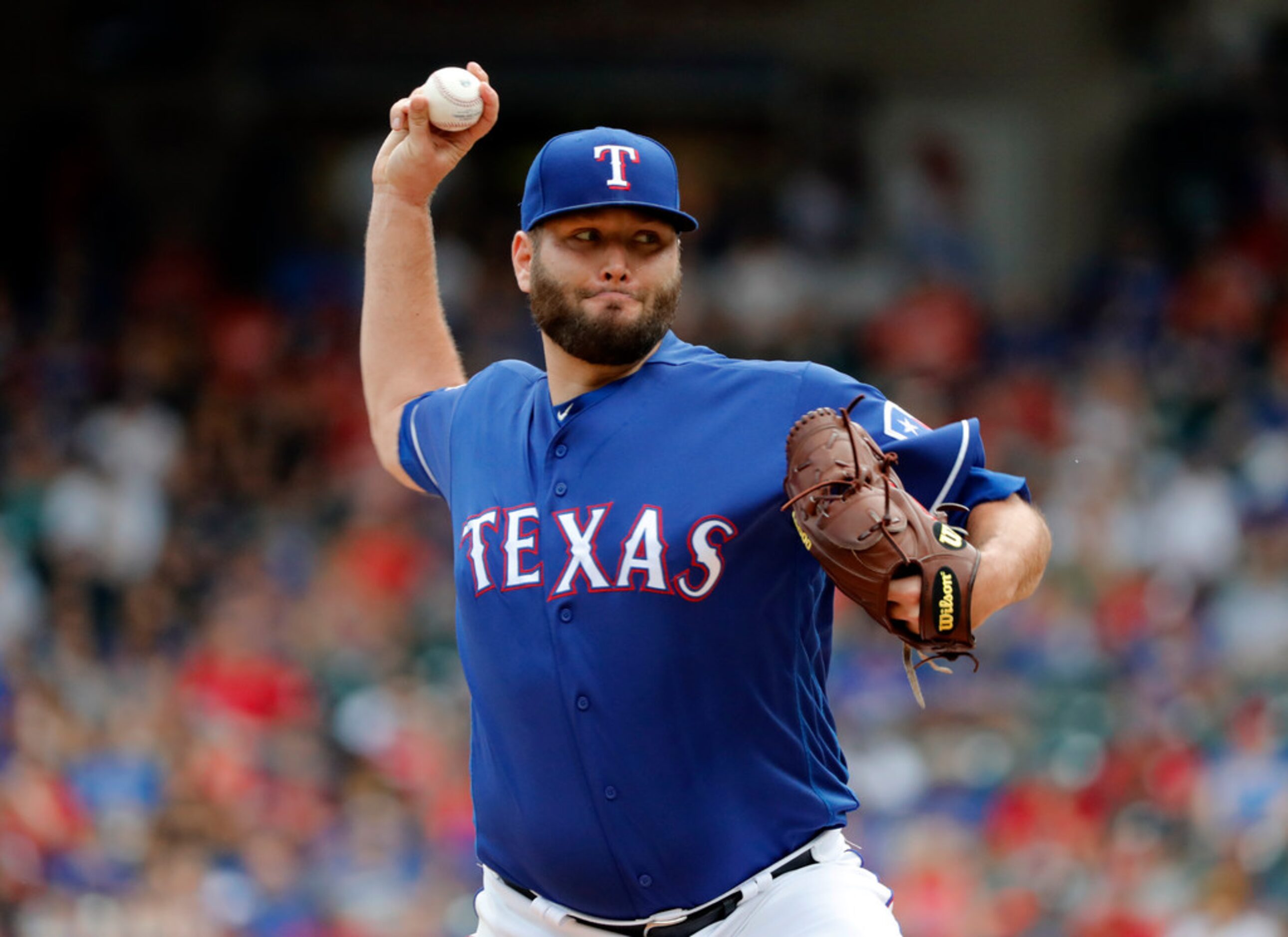 Texas Rangers starting pitcher Lance Lynn works against the Kansas City Royals int the first...