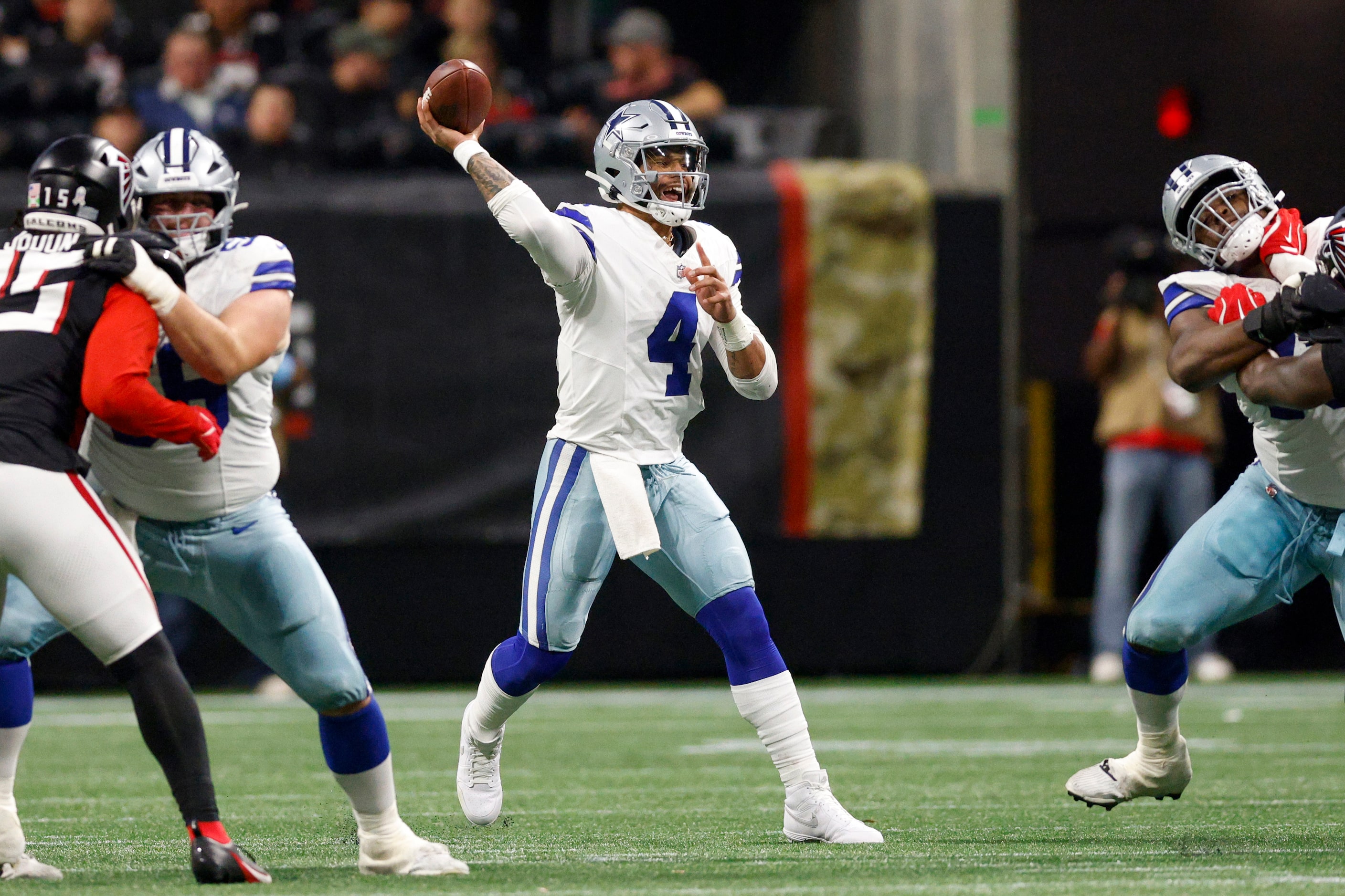 Dallas Cowboys quarterback Dak Prescott (4) throws a pass during the first half against the...