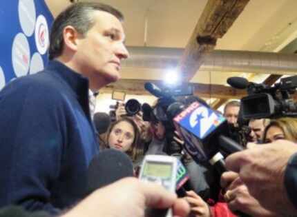  Sen. Ted Cruz talks with reporters Monday at Tuckaway Tavern and Butchery in Raymond, N.H.