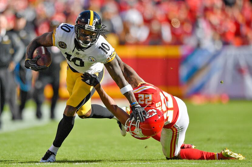 Pittsburgh Steelers wide receiver Martavis Bryant pushes down Kansas City Chiefs cornerback...
