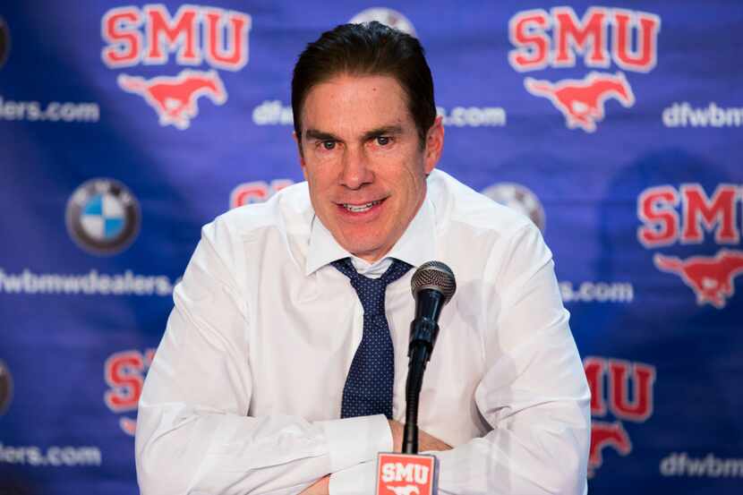 Southern Methodist Mustangs head coach Tim Jankovich answers questions from reporters after...