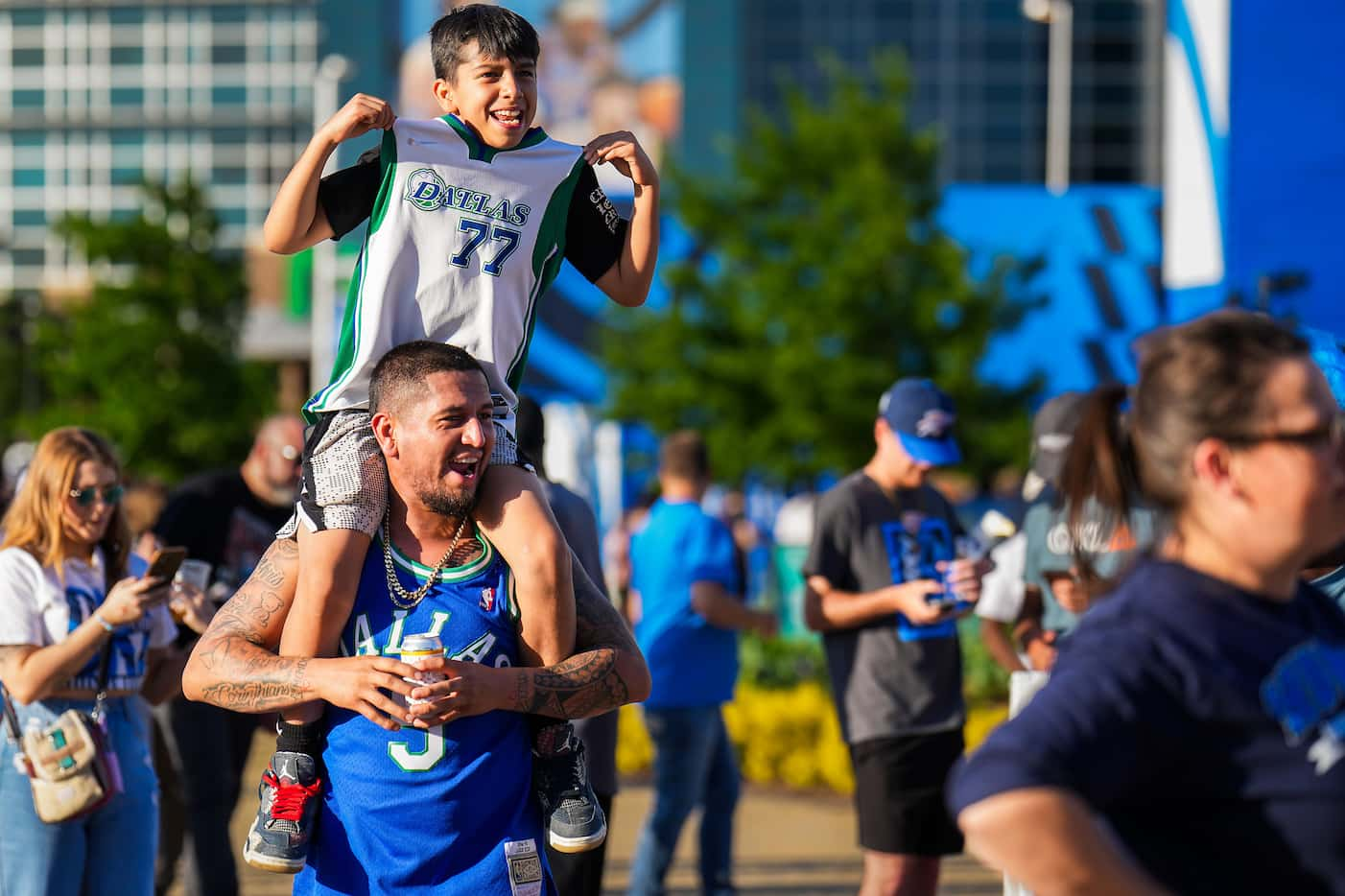 Dallas Mavericks fan Chris Armendariz Jr., of Amarillo, Texas, shows off his Luka Doncic #77...