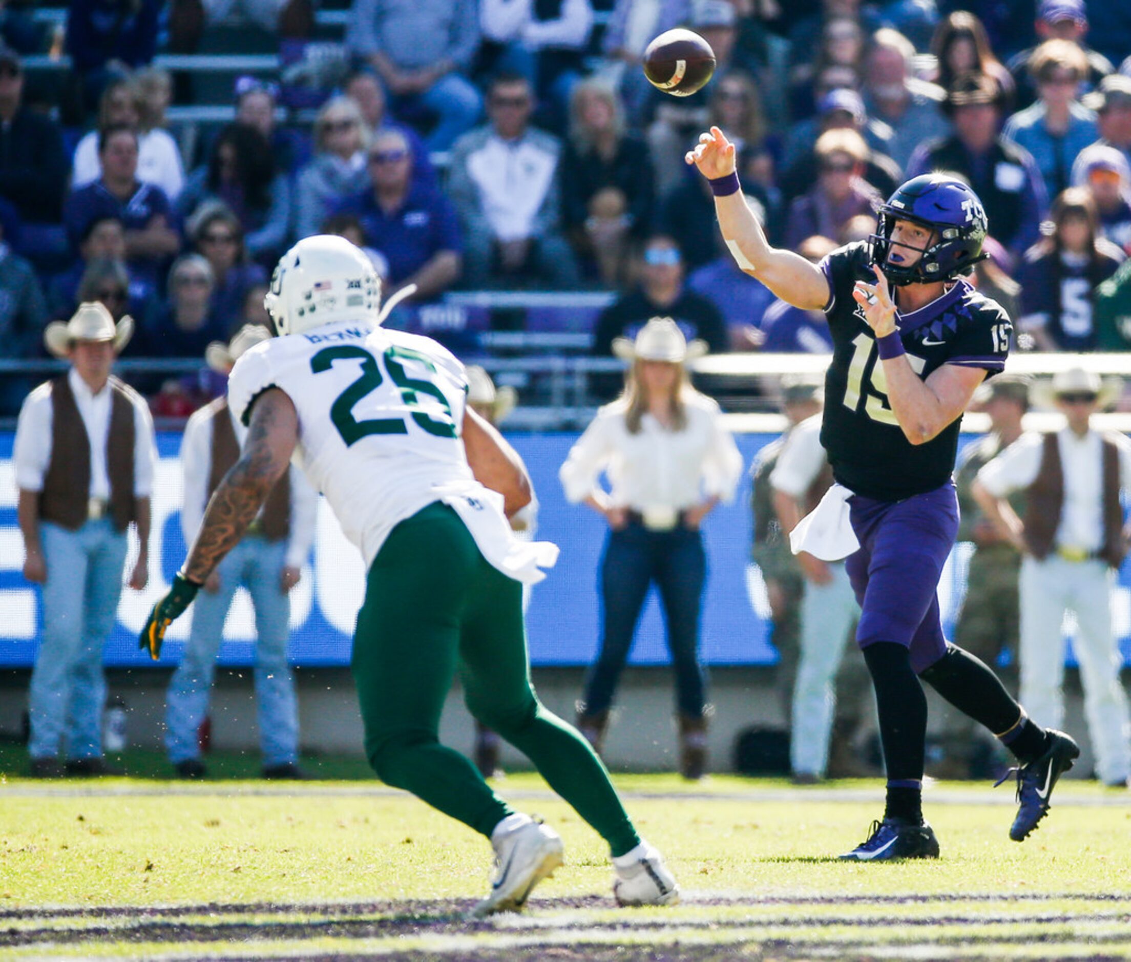 TCU Horned Frogs quarterback Max Duggan (15) fires off a pass over Baylor Bears linebacker...