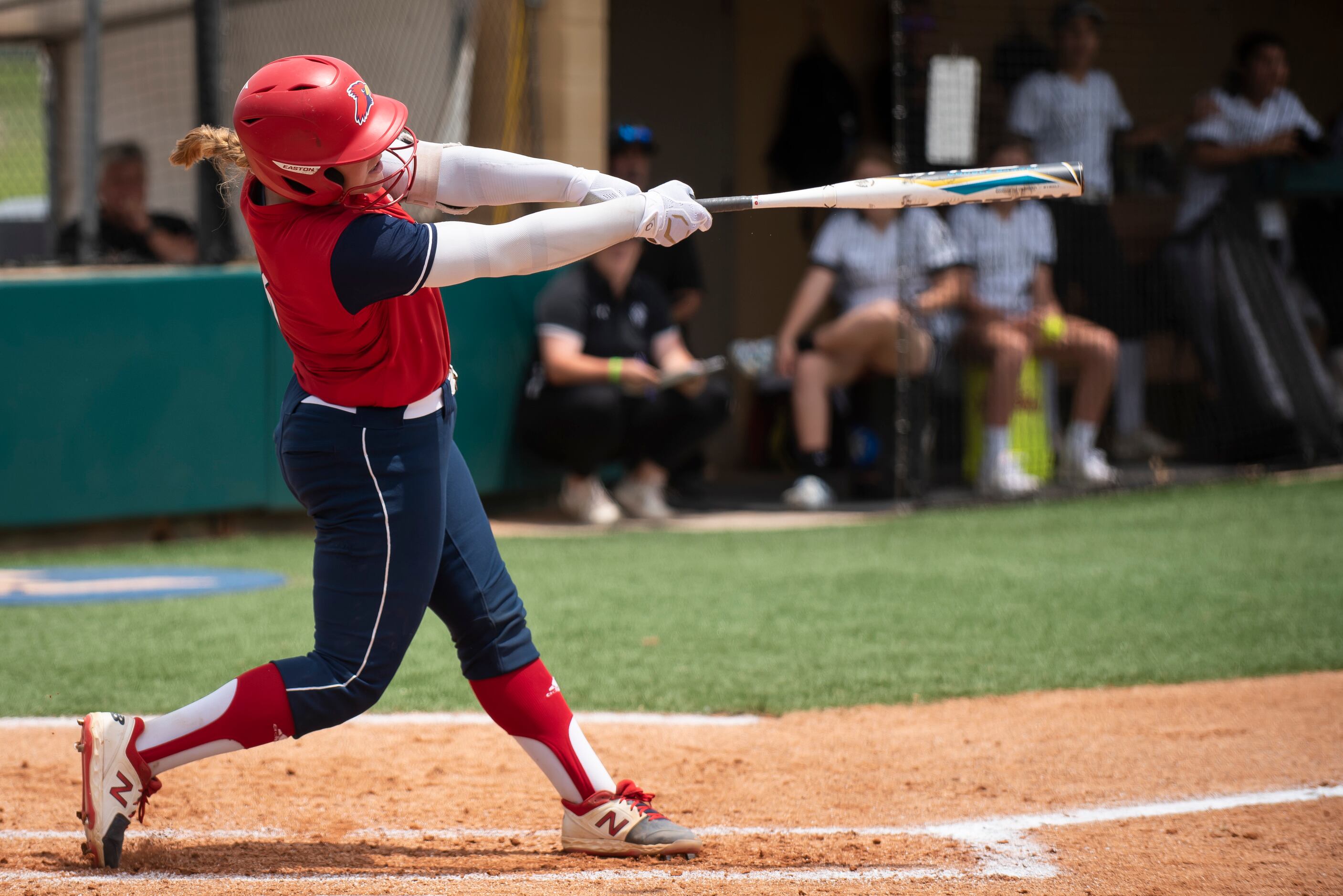 John Paul II senior Aubrey Hutzler (6) swings at a pitch during the TAPPS Softball Division...
