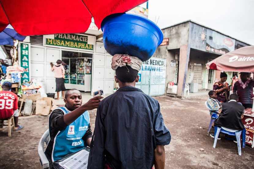 A man had his temperature checked in Goma, Congo, in July as part of the region's Ebola...