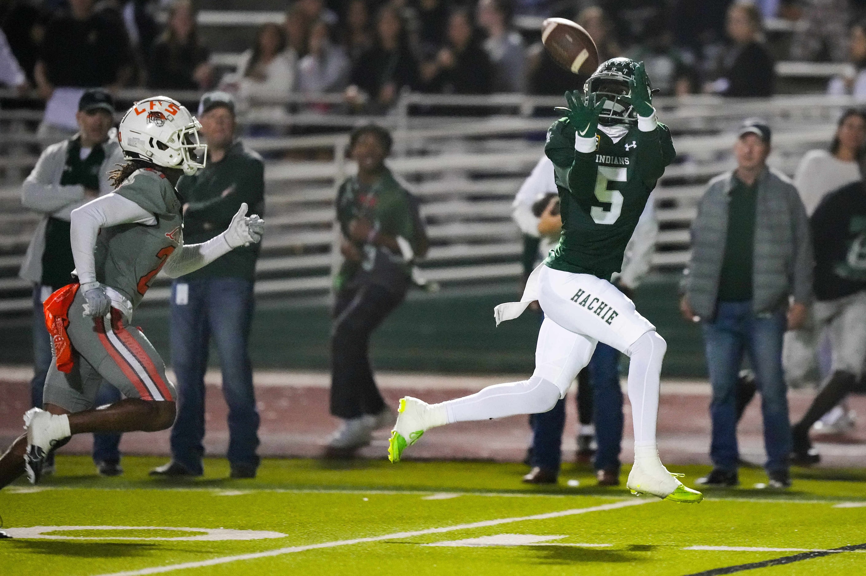 Waxahachie wide receiver Ly’Modrick Daniels (5) catches a 38-yard touchdown pass as...