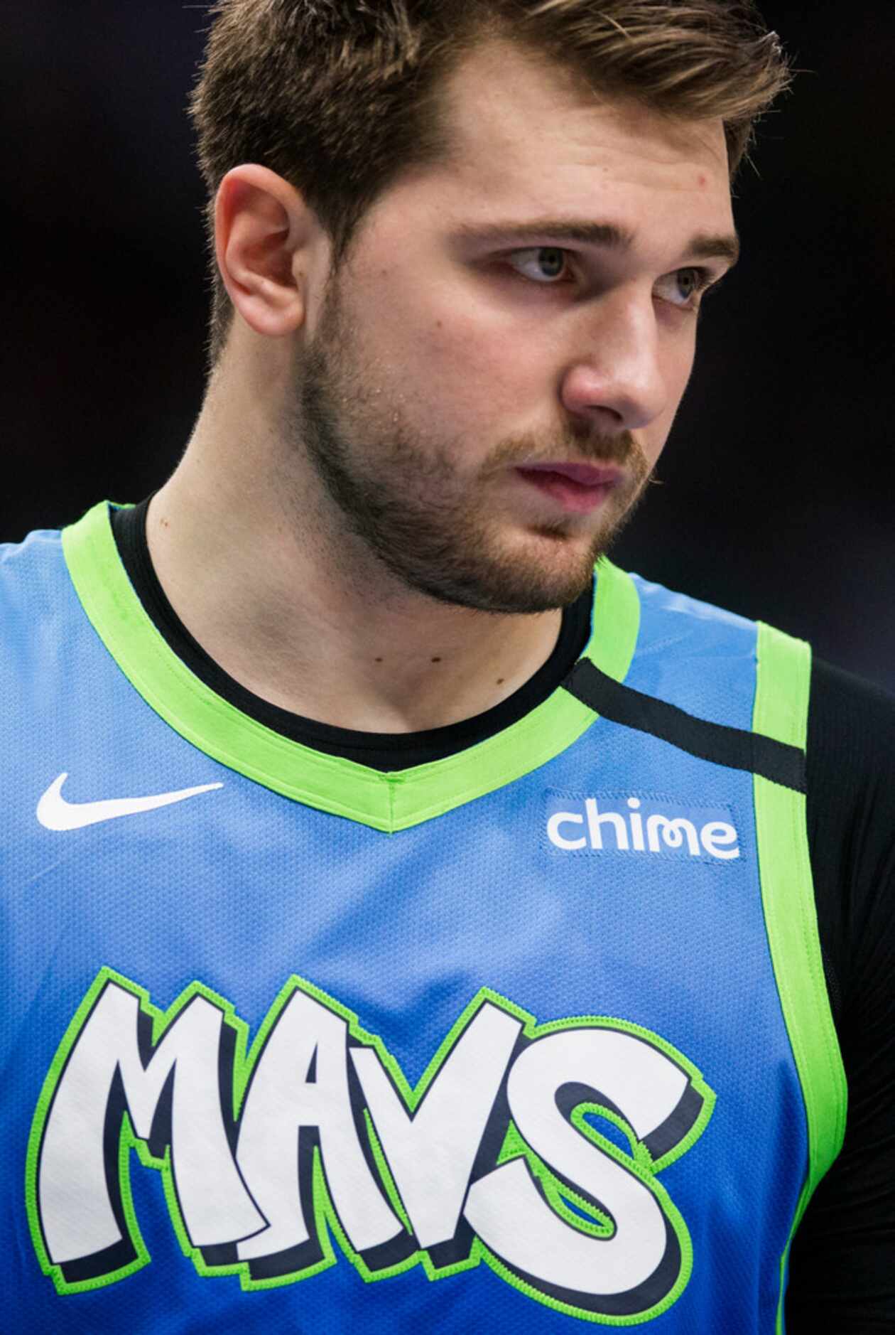 Dallas Mavericks forward Luka Doncic (77) wears a new Chime sponsor patch on his jersey...