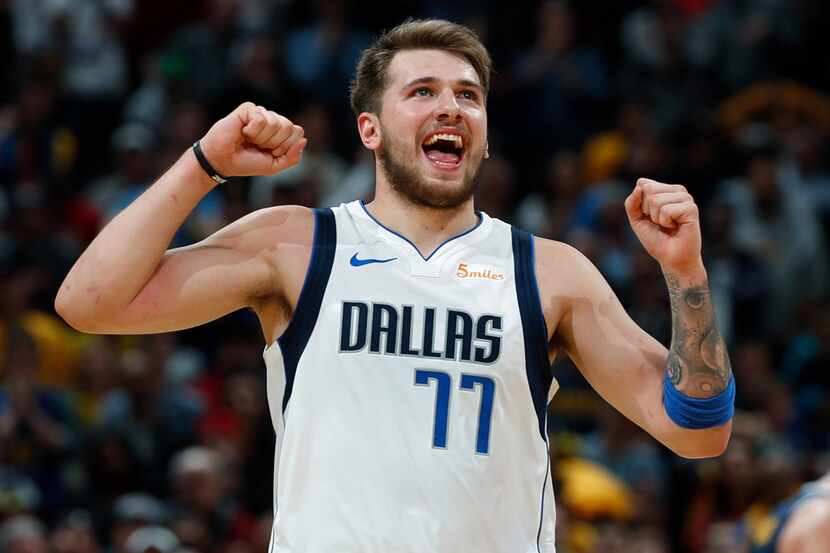 Dallas Mavericks forward Luka Doncic reacts after missing a foul shot late in the second...