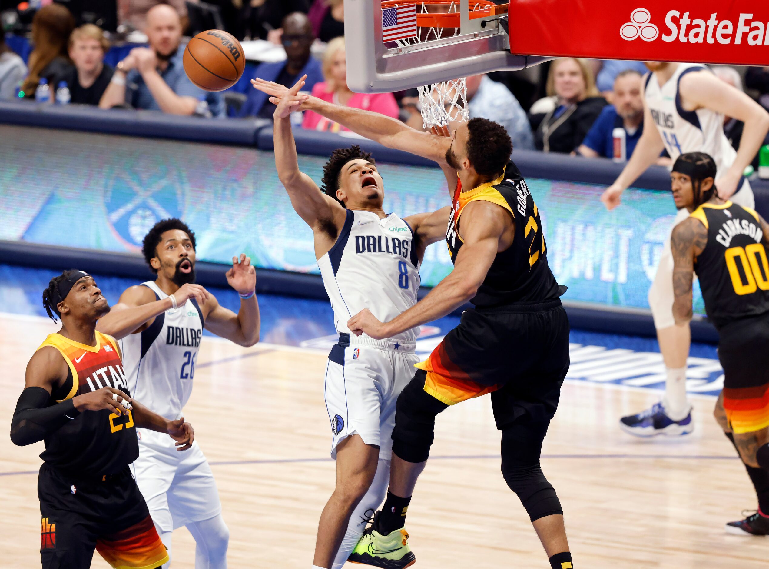 Utah Jazz center Rudy Gobert (27) swats a shot out of the hands of Dallas Mavericks guard...