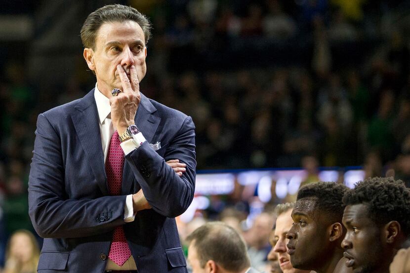 FILE - In this Jan. 4, 2017, file photo, Louisville head coach Rick Pitino looks on as his...