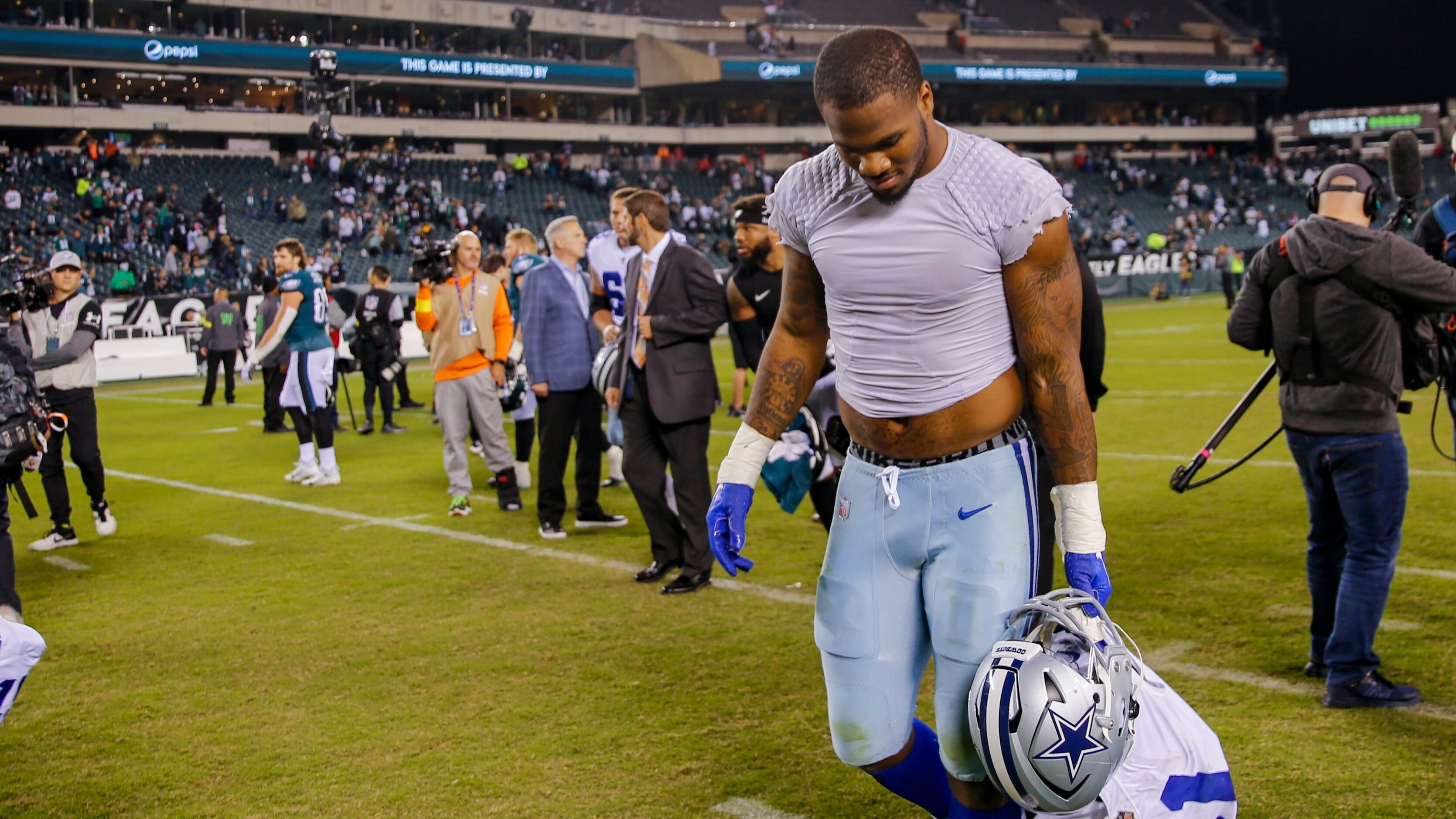 Dallas Cowboys linebacker Micah Parsons (11) walks off the field following a loss against...