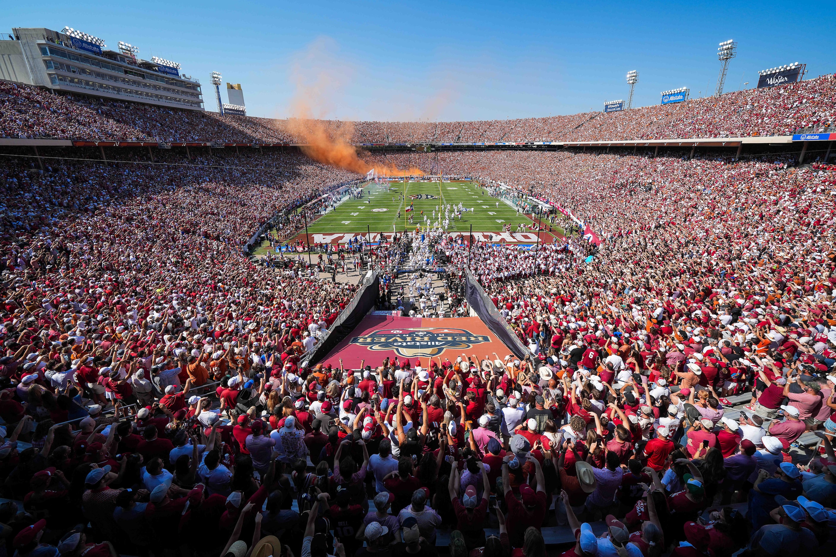 The Texas Longhorns take the field before an NCAA college football game against Oklahoma at...