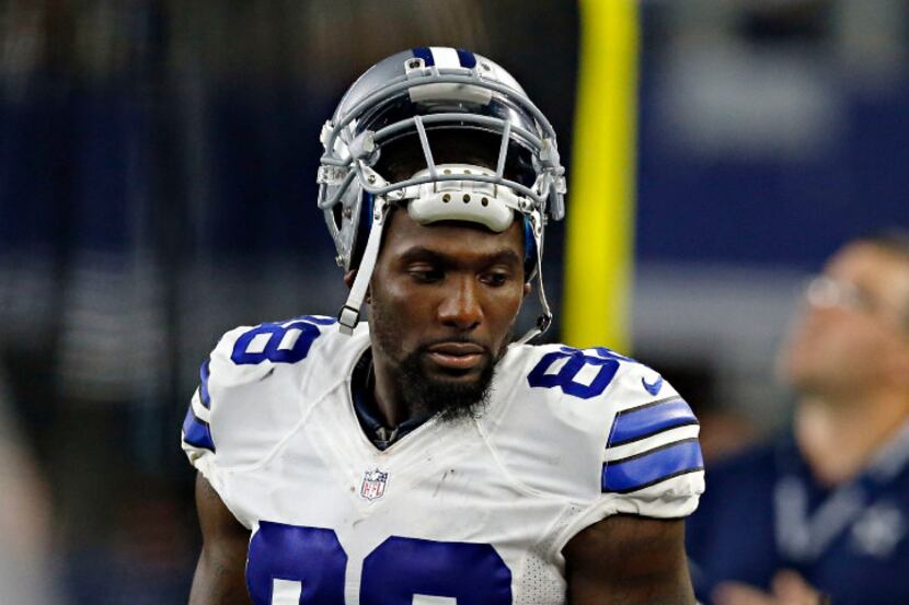 Dallas Cowboys wide receiver Dez Bryant (88) talks to wide receiver Terrance Williams during...