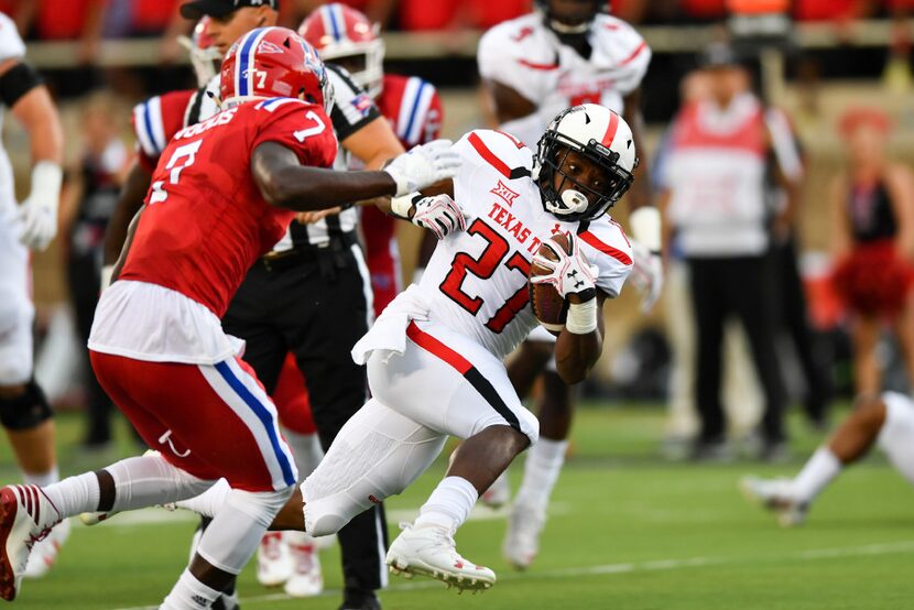 LUBBOCK, TX - SEPTEMBER 17: Running back Demarcus Felton #27 of the Texas Tech Red Raiders...