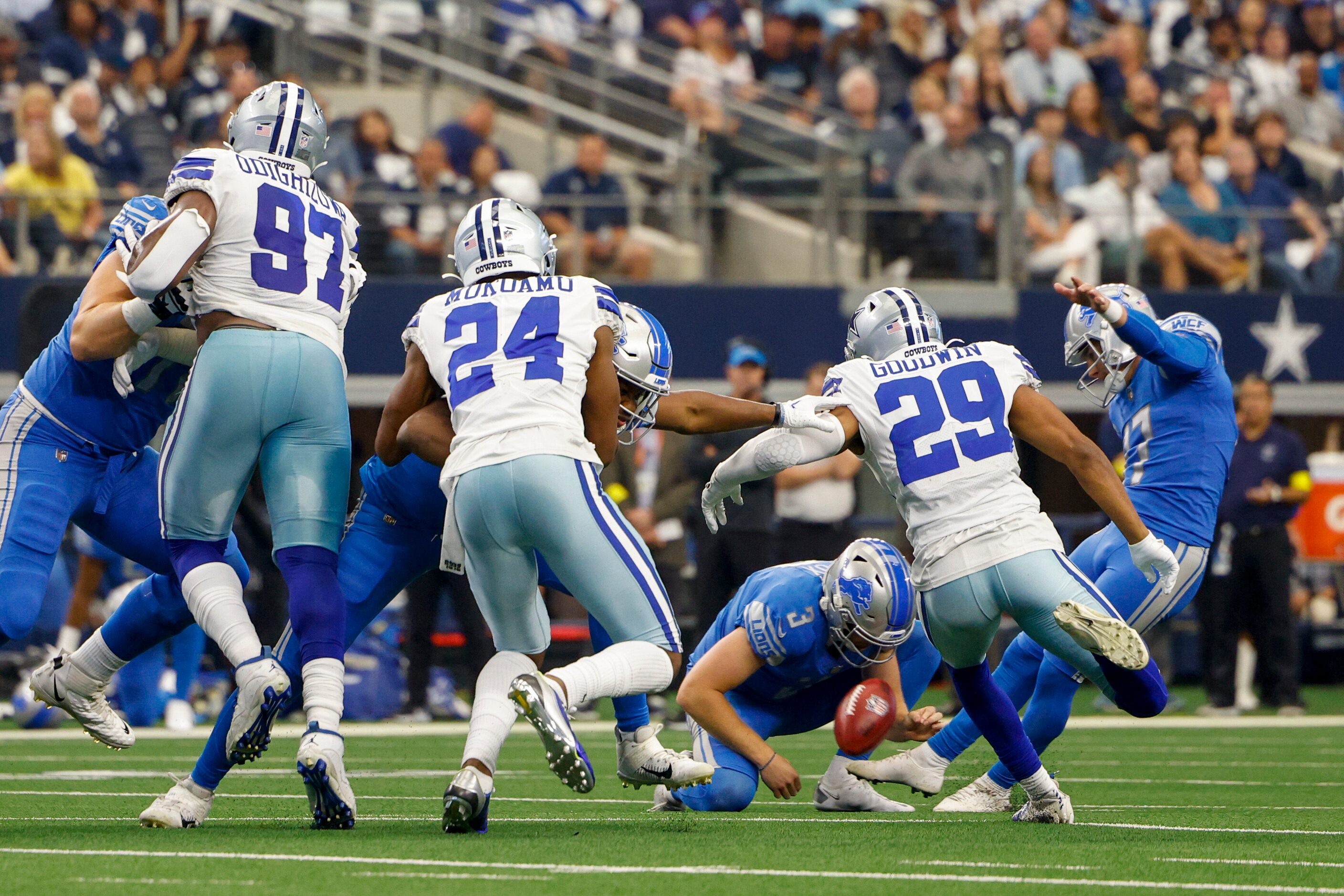 Detroit Lions place kicker Michael Badgley (17) converts on a field goal during the first...