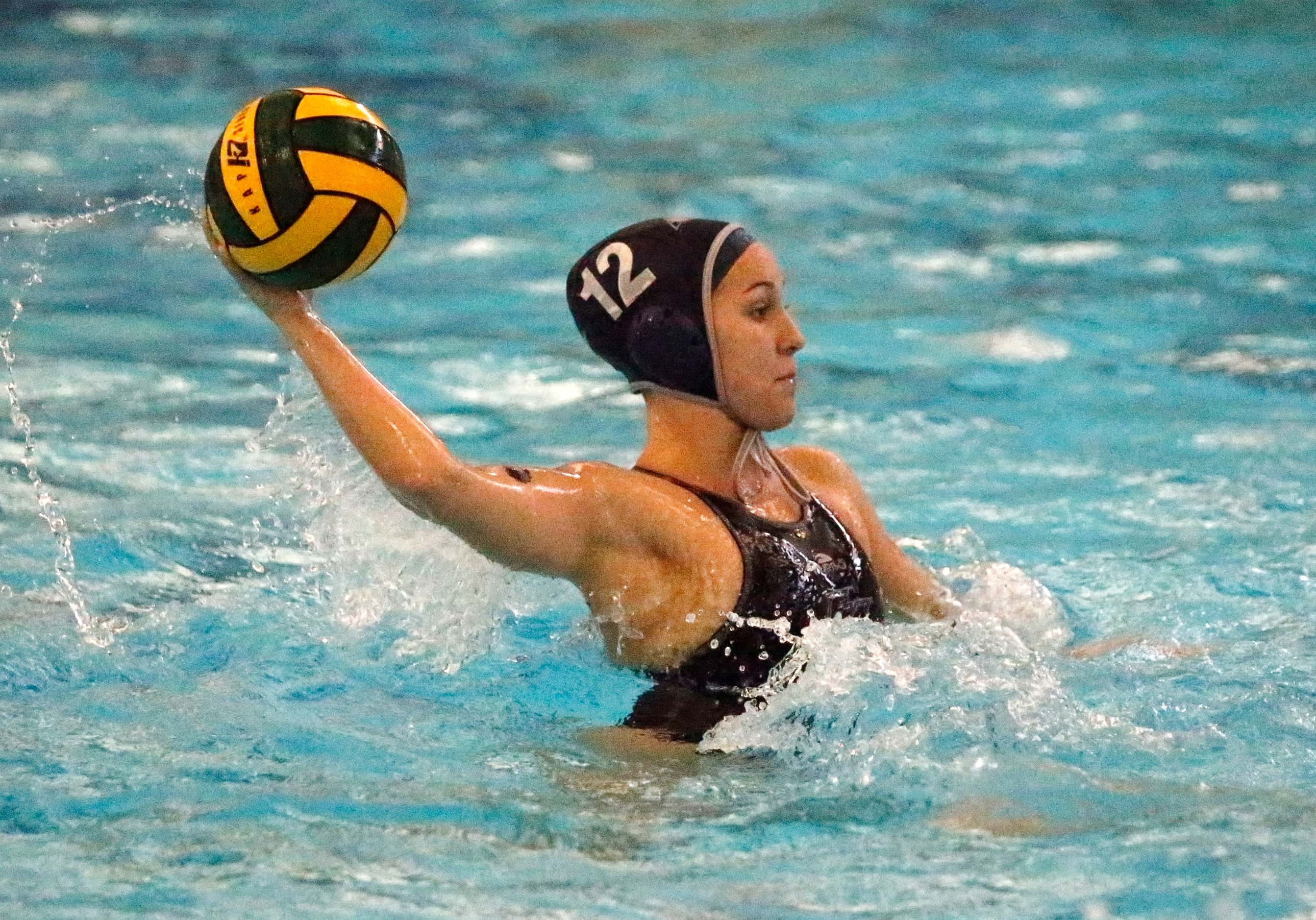 Flower Mound’s Ava Pawlik (12) takes a shot during the firstk half as Southlake High School...