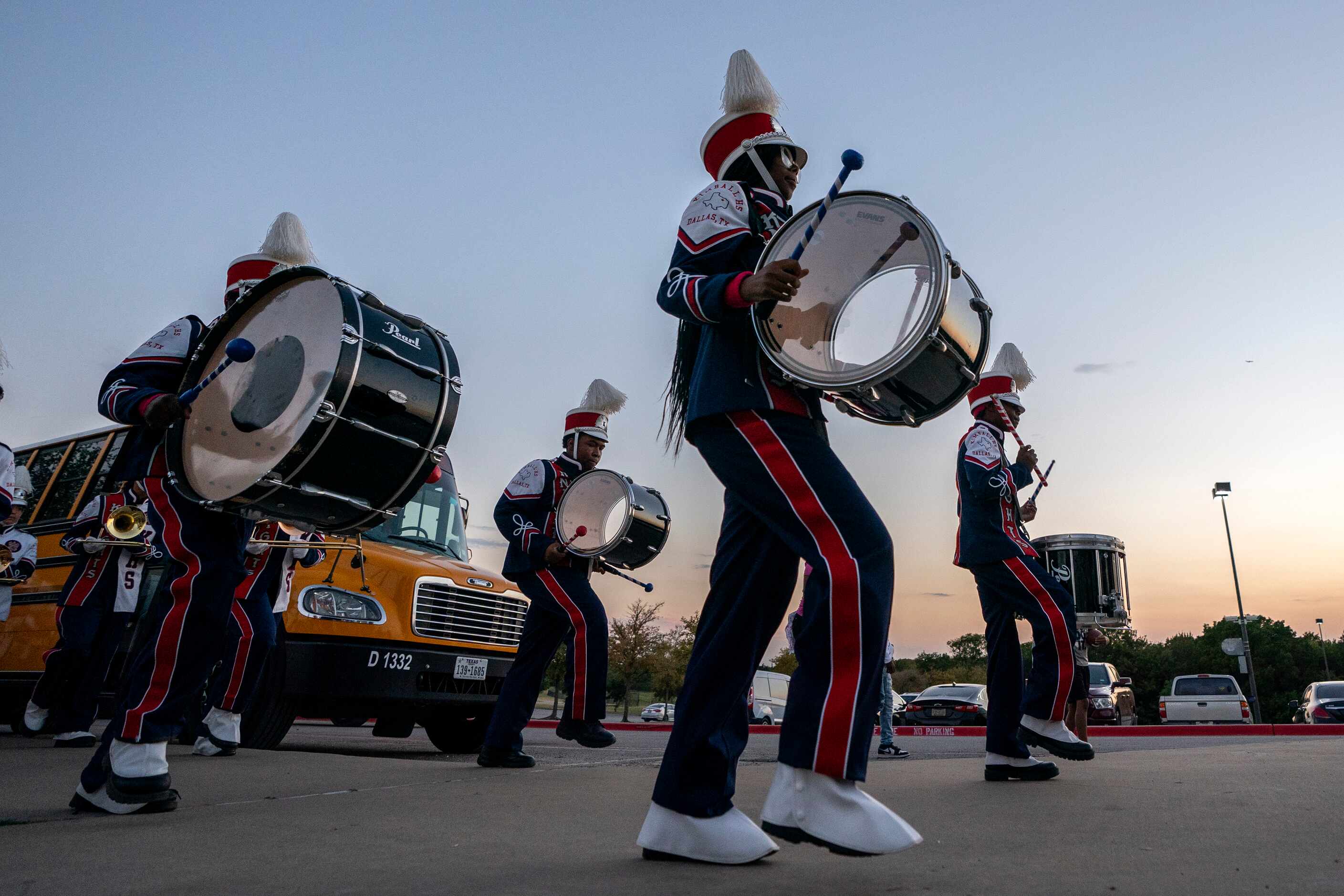 The Kimball band enters the stadium before a high school football game against South Oak...