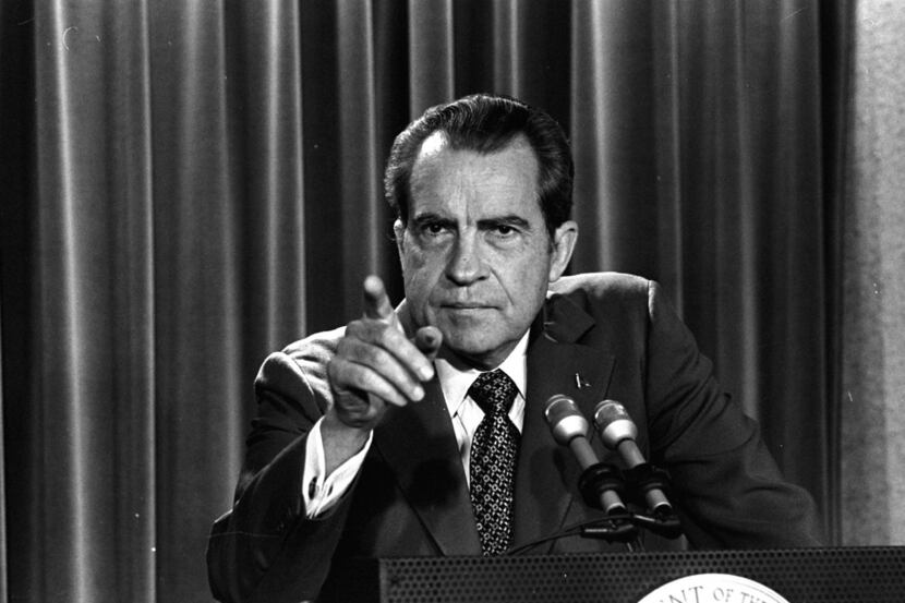 FILE - In this March 15, 1973 file photo, President Nixon tells a White House news...