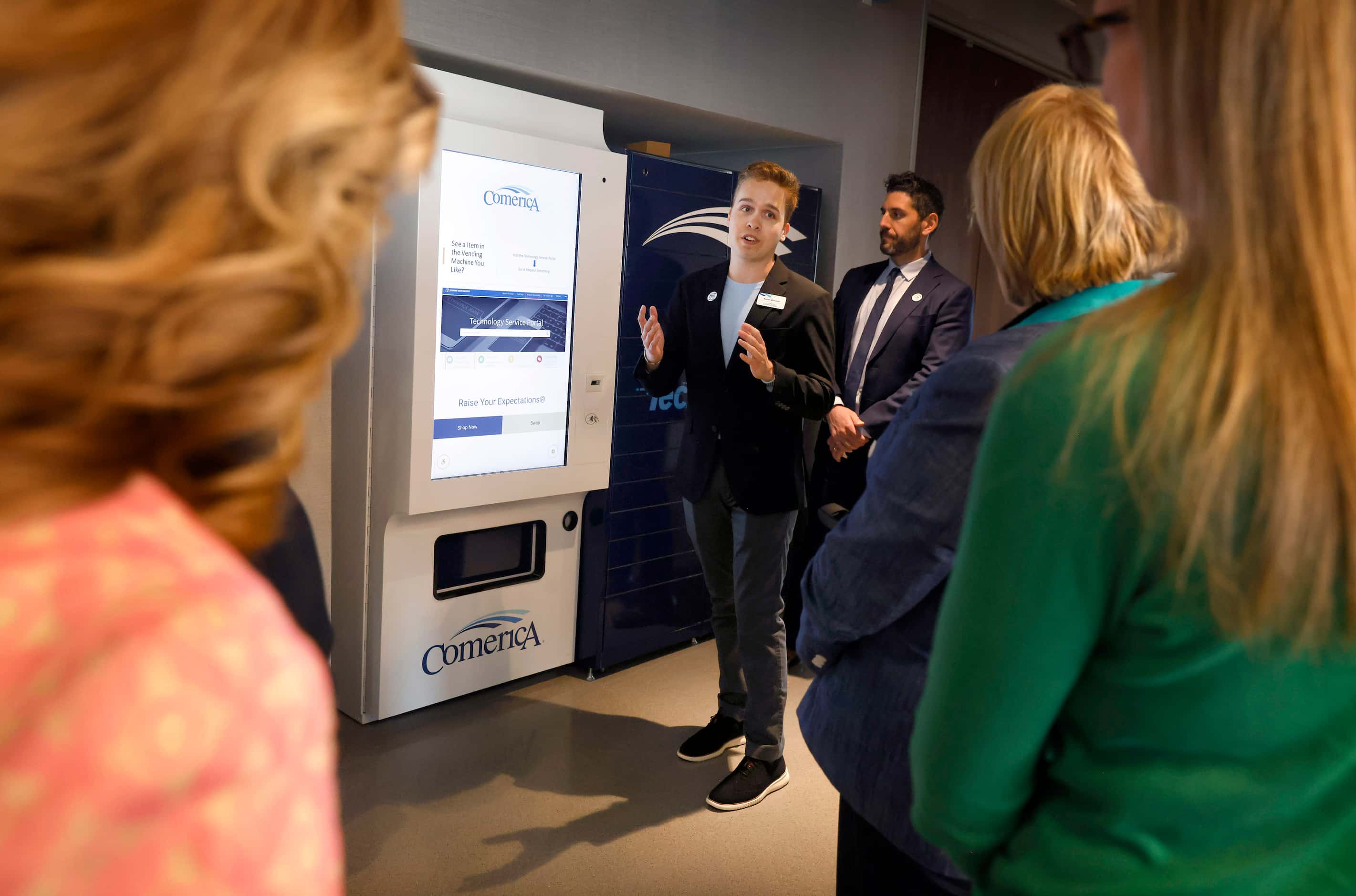 Comerica’s Austen Merconti showed how the company tech locker works for those on a tour of...