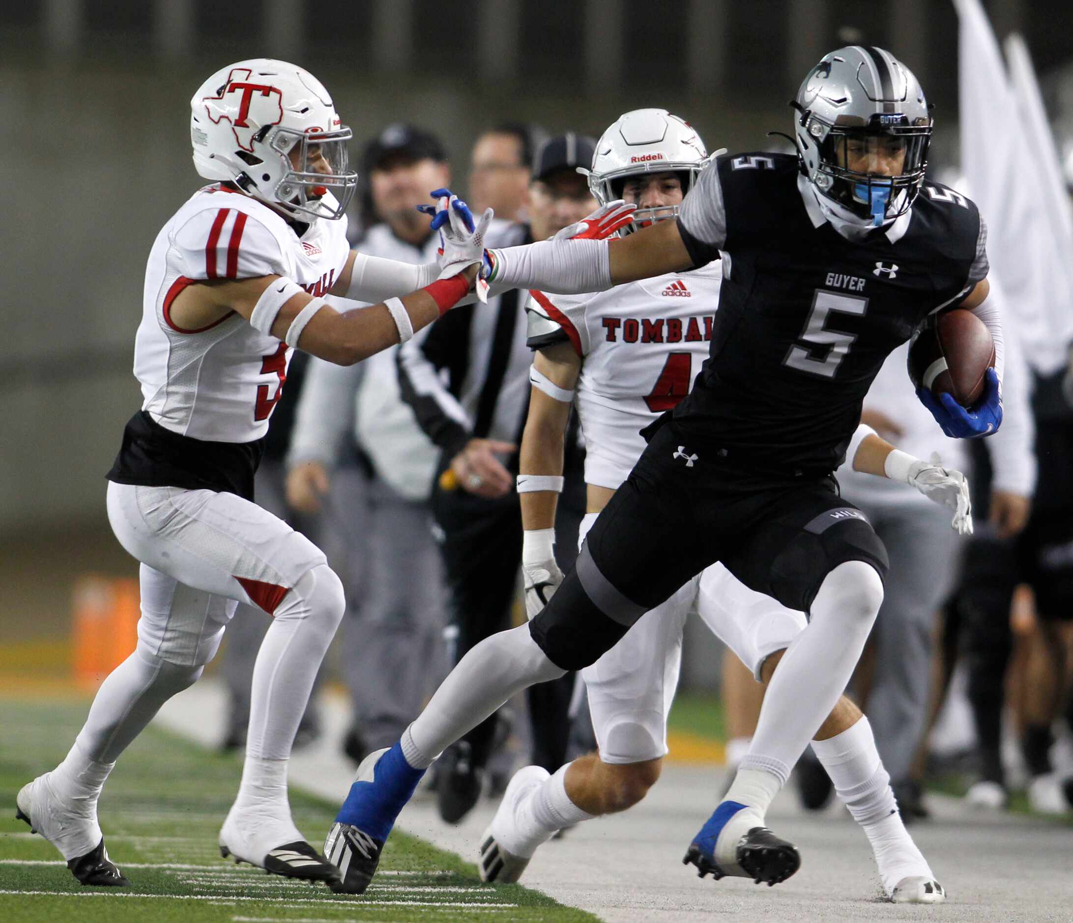 Denton Guyer receiver Jace Wilson (5) tacks on first down yardage following a first quarter...