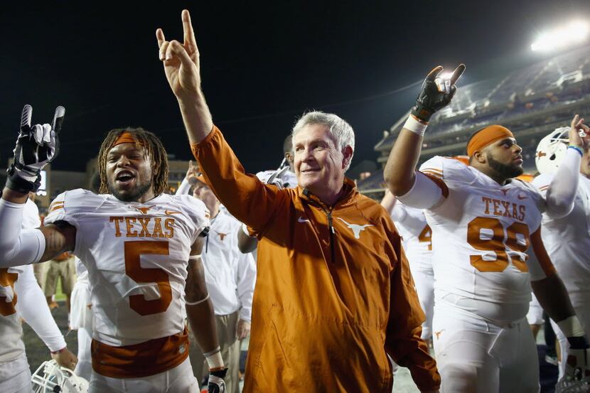 FORT WORTH, TX - OCTOBER 26:  Head coach Mack Brown of the Texas Longhorns celebrates with...