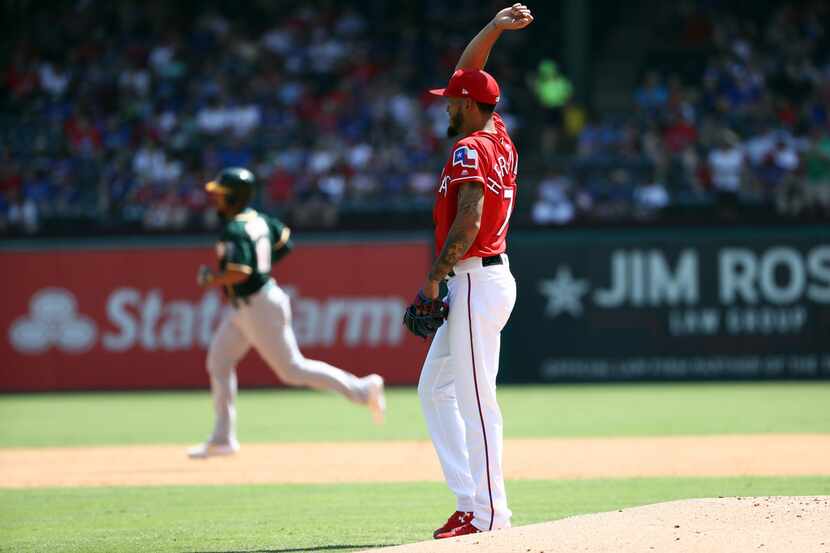 ARLINGTON, TEXAS - SEPTEMBER 15:  Jonathan Hernandez #72 of the Texas Rangers steps off the...