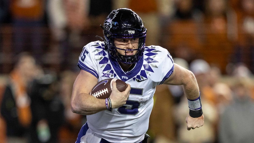 TCU quarterback Max Duggan (15) scrambles against Texas during the second half of an NCAA...