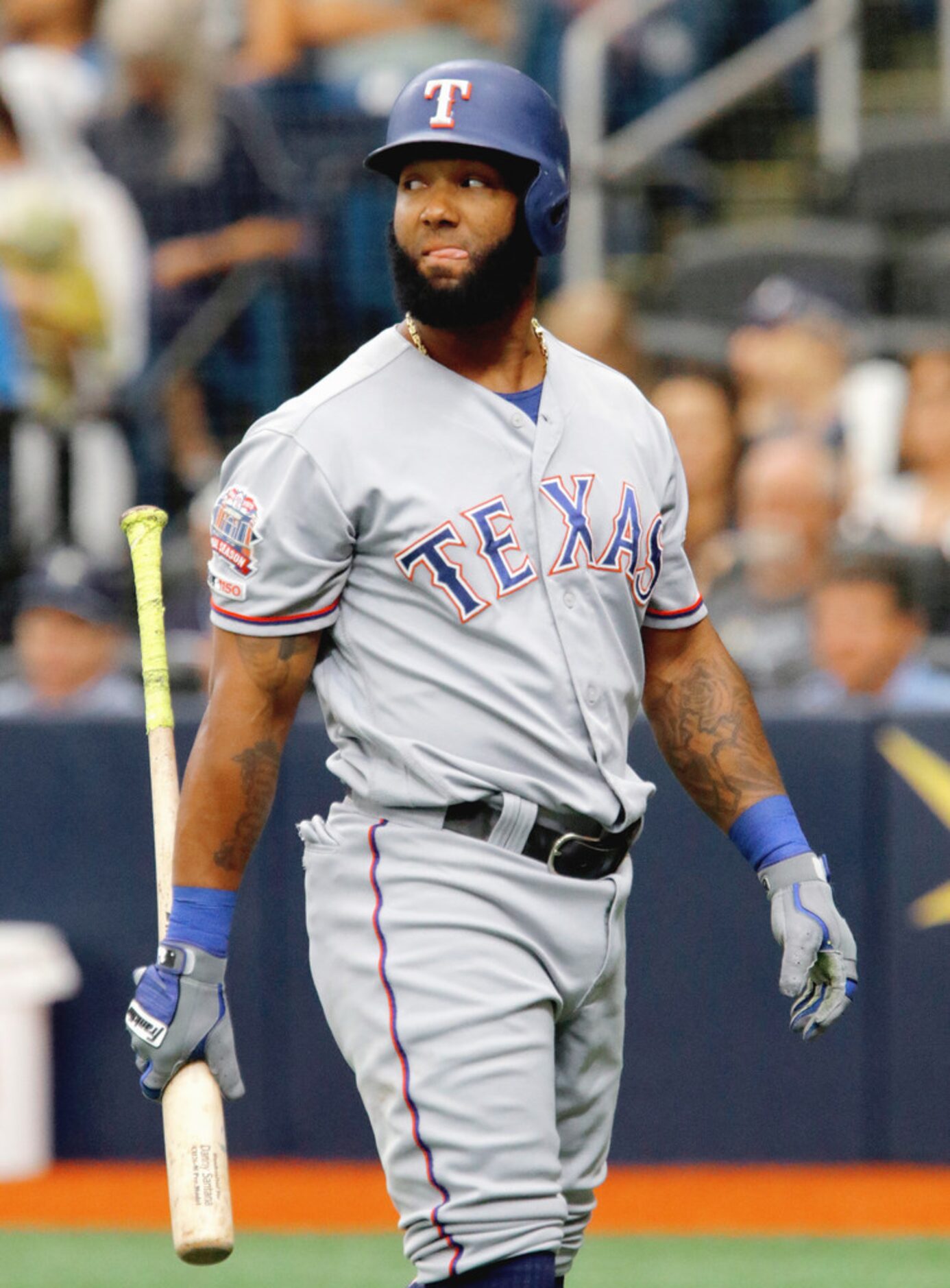 ST. PETERSBURG, FL - JUNE 30:  Danny Santana #38 of the Texas Rangers walks back to the...