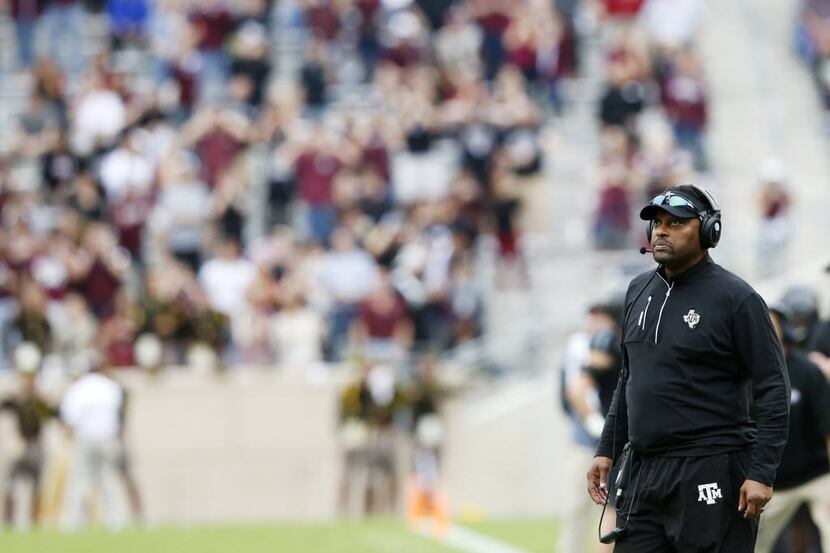 Texas A&M Aggies head coach Kevin Sumlin looks on before the next play in a game against...