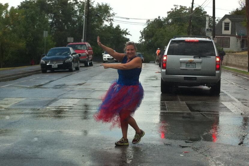  Rosemont principal Anna Brining directs traffic after school between Rosemont Primary and...