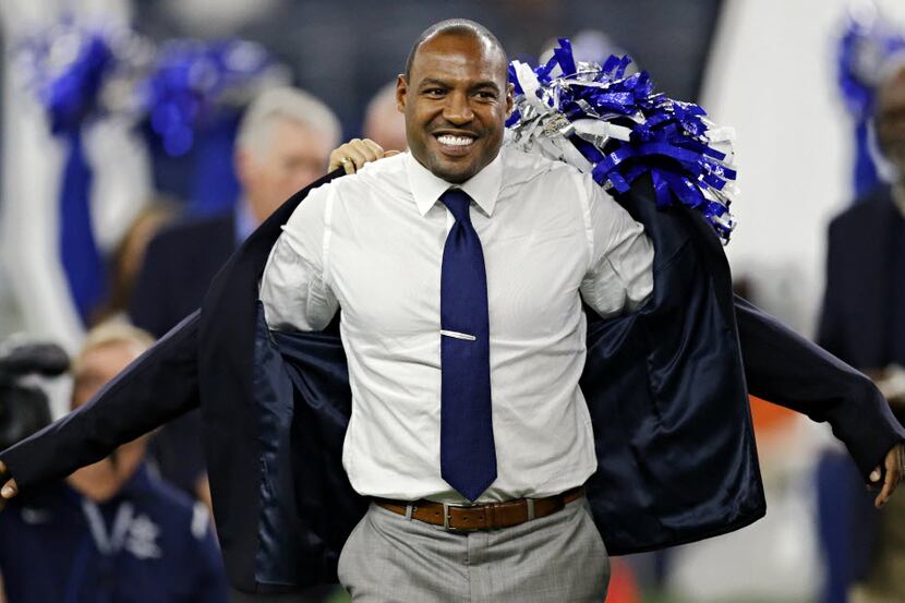 Dallas Cowboys Darren Woodson is inducted into the Ring of Honor during the first half of...