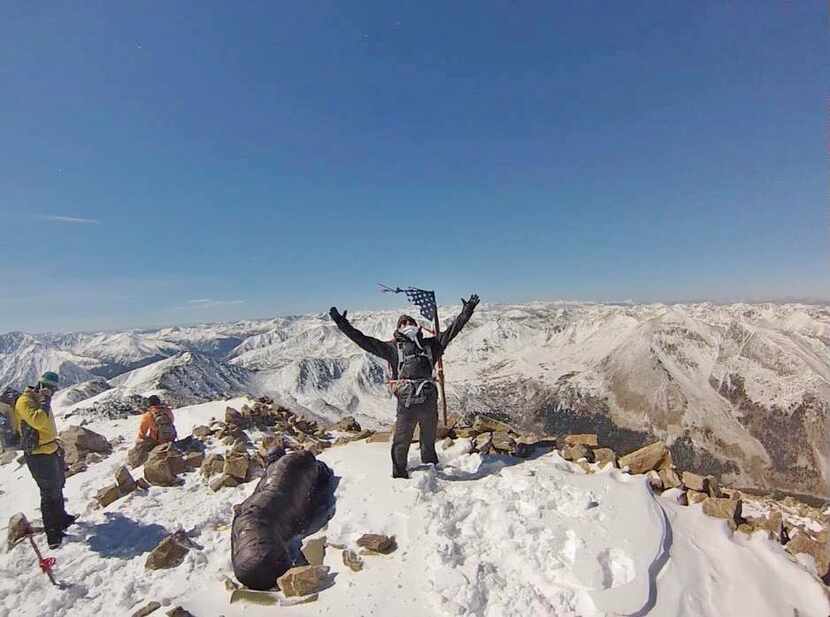 
Hayden Wilson, 21, originally from Preston Hollow, reaches the top of Mount Elbert, the...