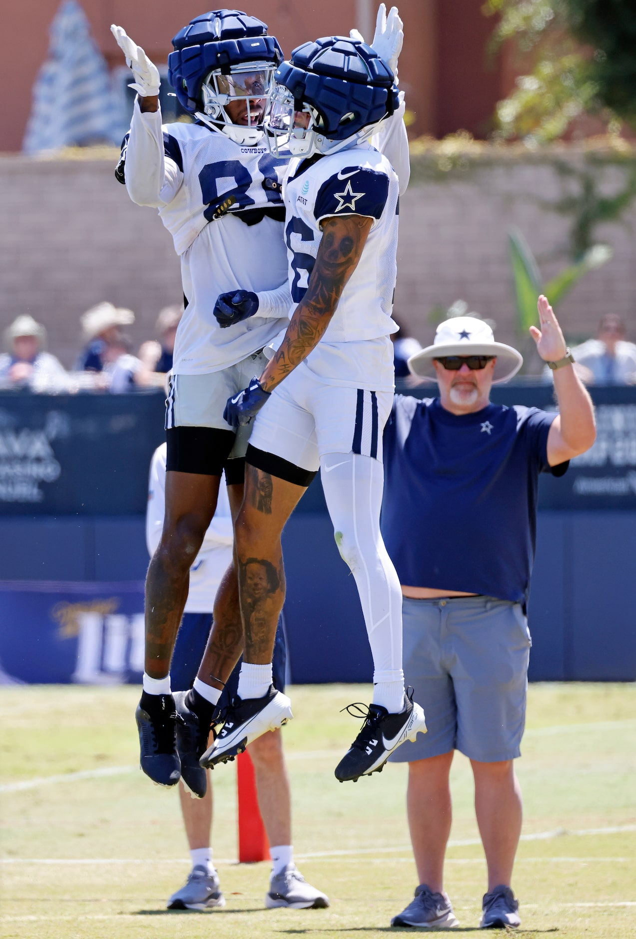 Dallas Cowboys wide receiver Racey McMath (80) congratulates fellow wide receiver Jalen...