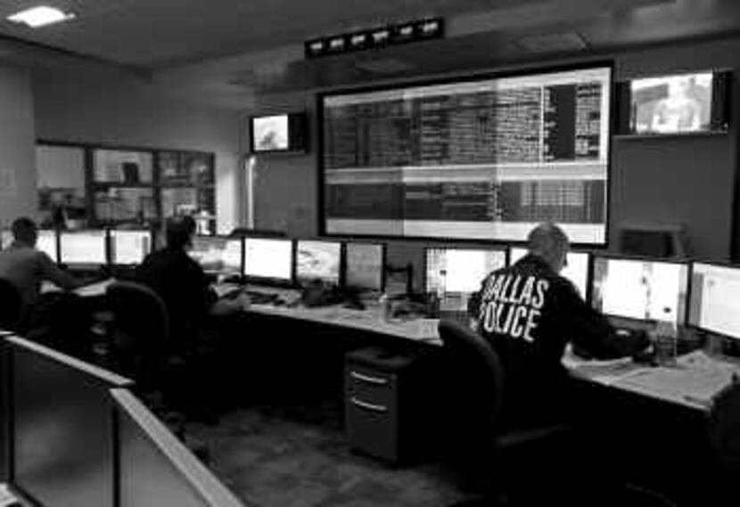 This photo from The Dallas Morning News archives shows Dallas police in their fusion center....